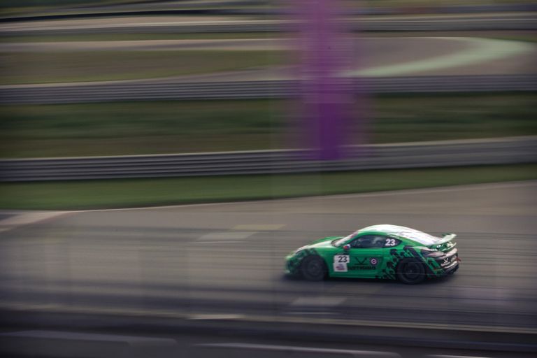Motorsport car mid-corner, motion blur